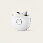 White and silver electronic device on a light beige background