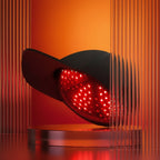 Modern chair with red interior and black exterior against an orange curtain background